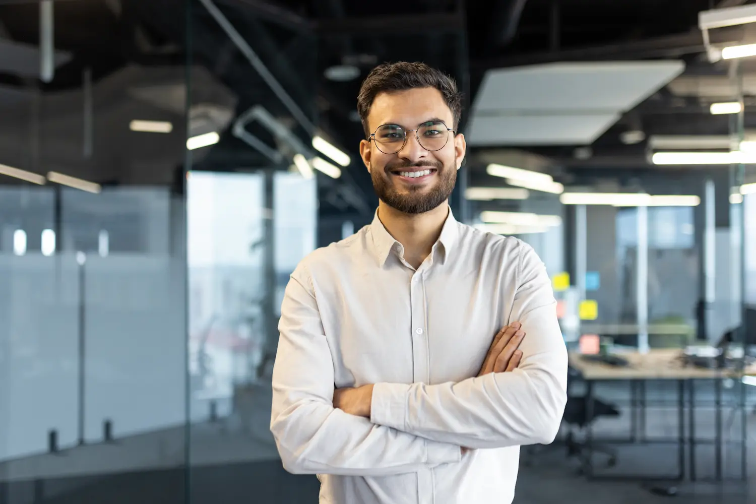 Confident person smiling after building healthy habits and reaching personal goals